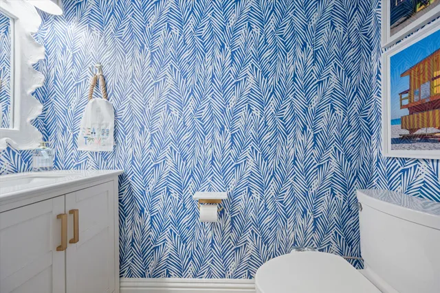 a bathroom with a toilet and a sink