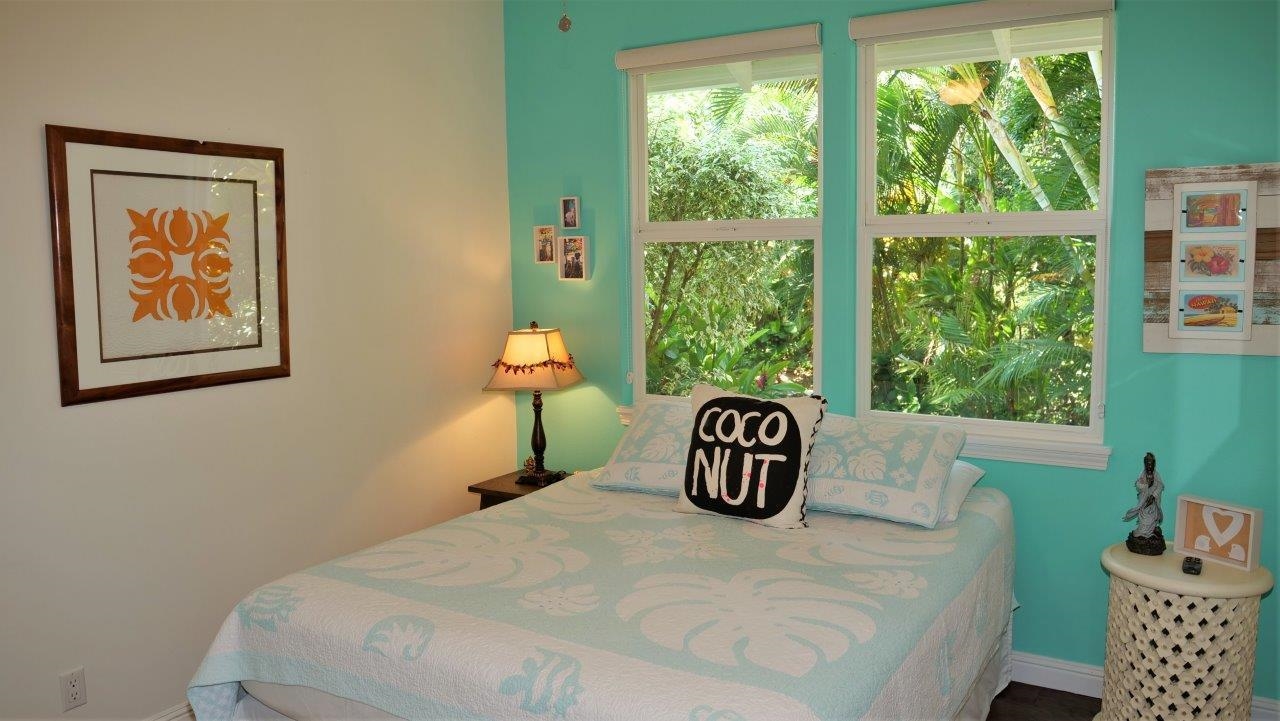 47 Hale Lio Place Haiku, HI 96708 - Photo 13 of 25 a bedroom with a bed and a window