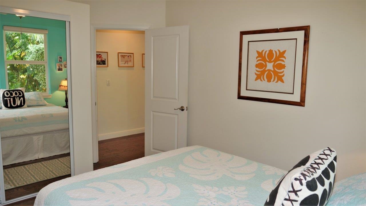 47 Hale Lio Place Haiku, HI 96708 - Photo 14 of 25 a bedroom with a bed and a painting on the wall