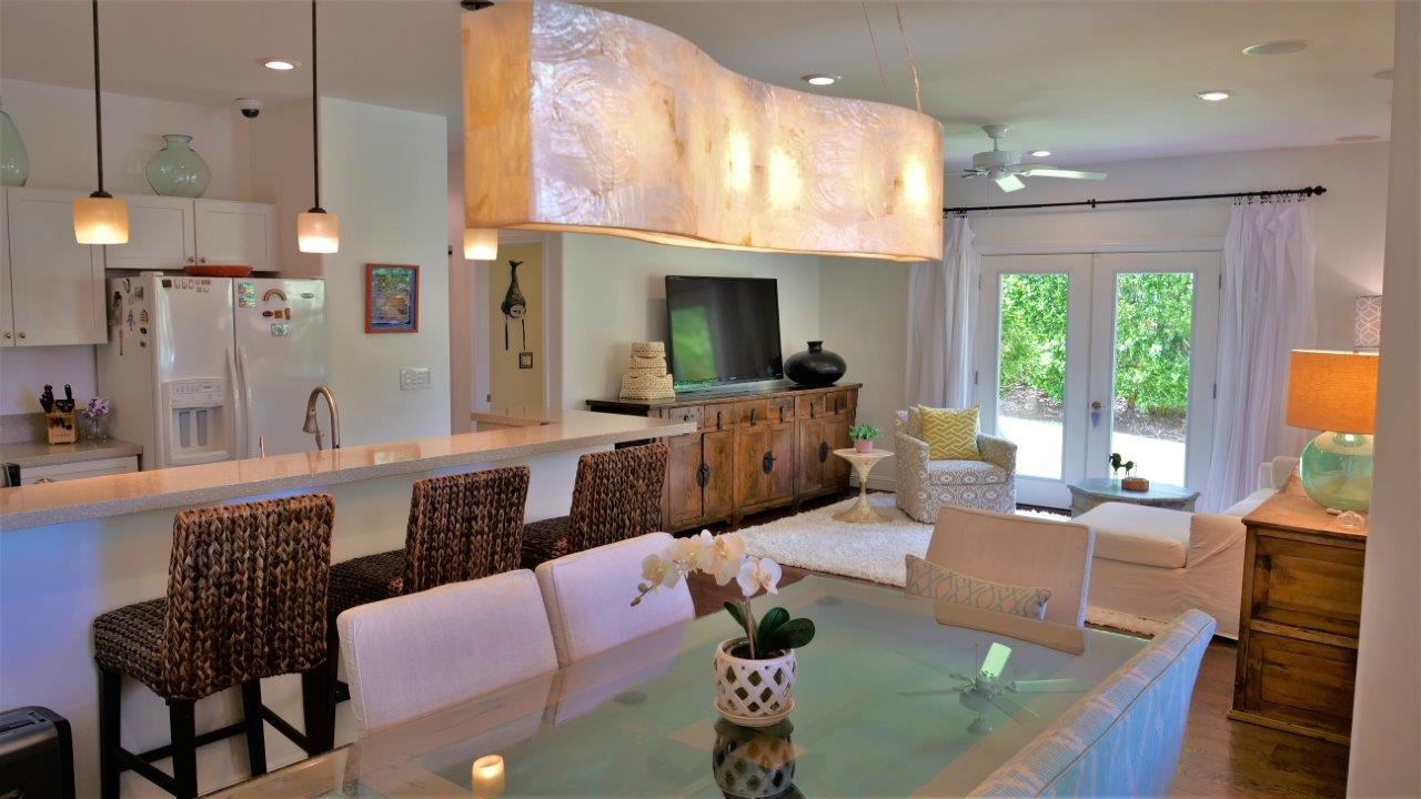 47 Hale Lio Place Haiku, HI 96708 - Photo 5 of 25 a living room with furniture large window and wooden floor