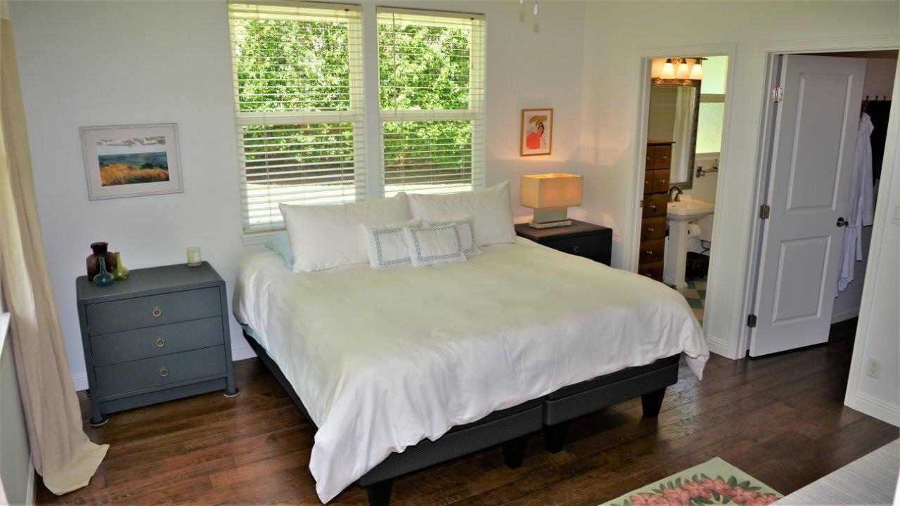 47 Hale Lio Place Haiku, HI 96708 - Photo 10 of 25 a large bed sitting in a bedroom next to a window