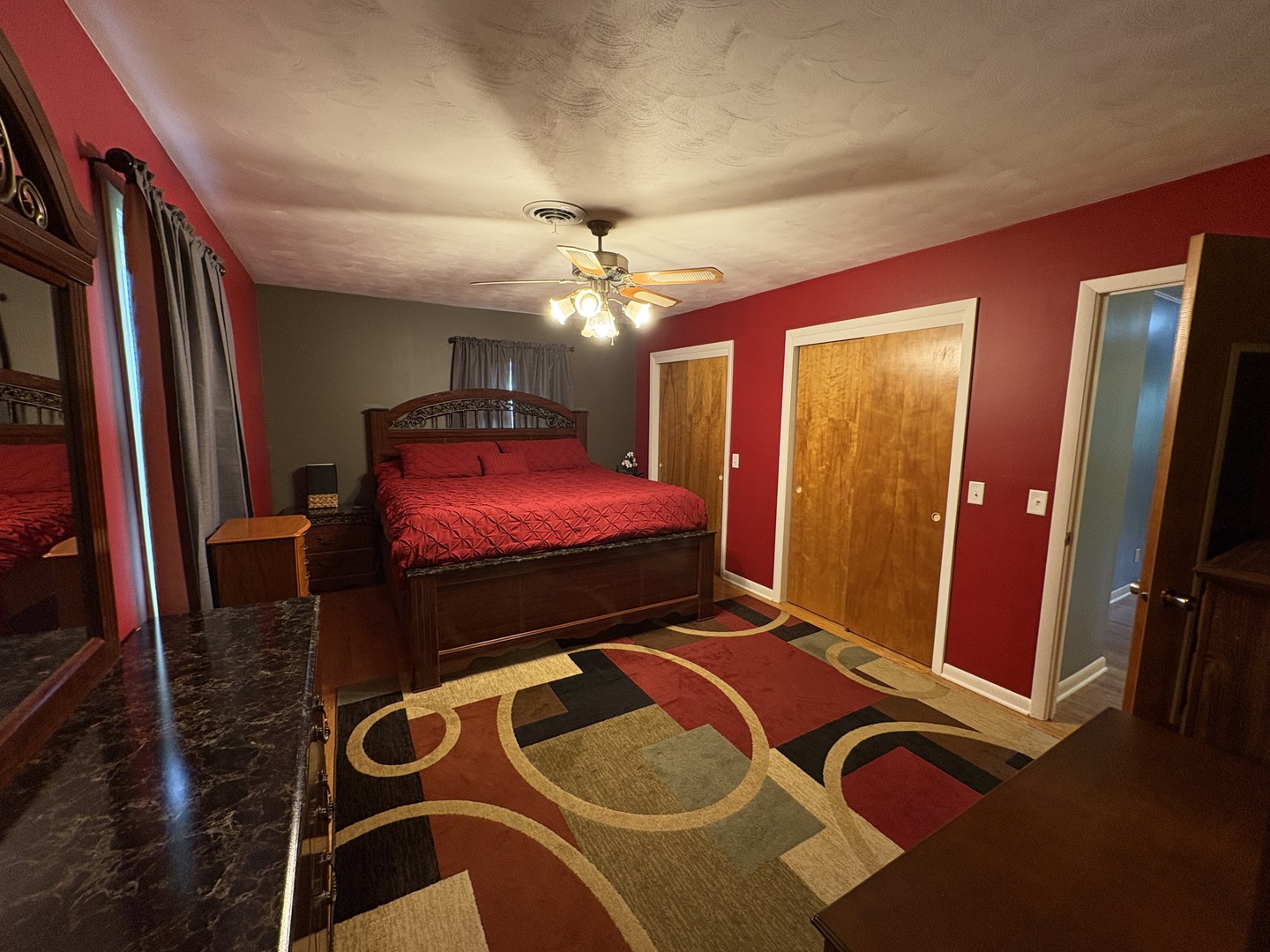 320 South Main Street Creston, IL 61068 - Photo 16 of 34 a bedroom with a bed and a mirror