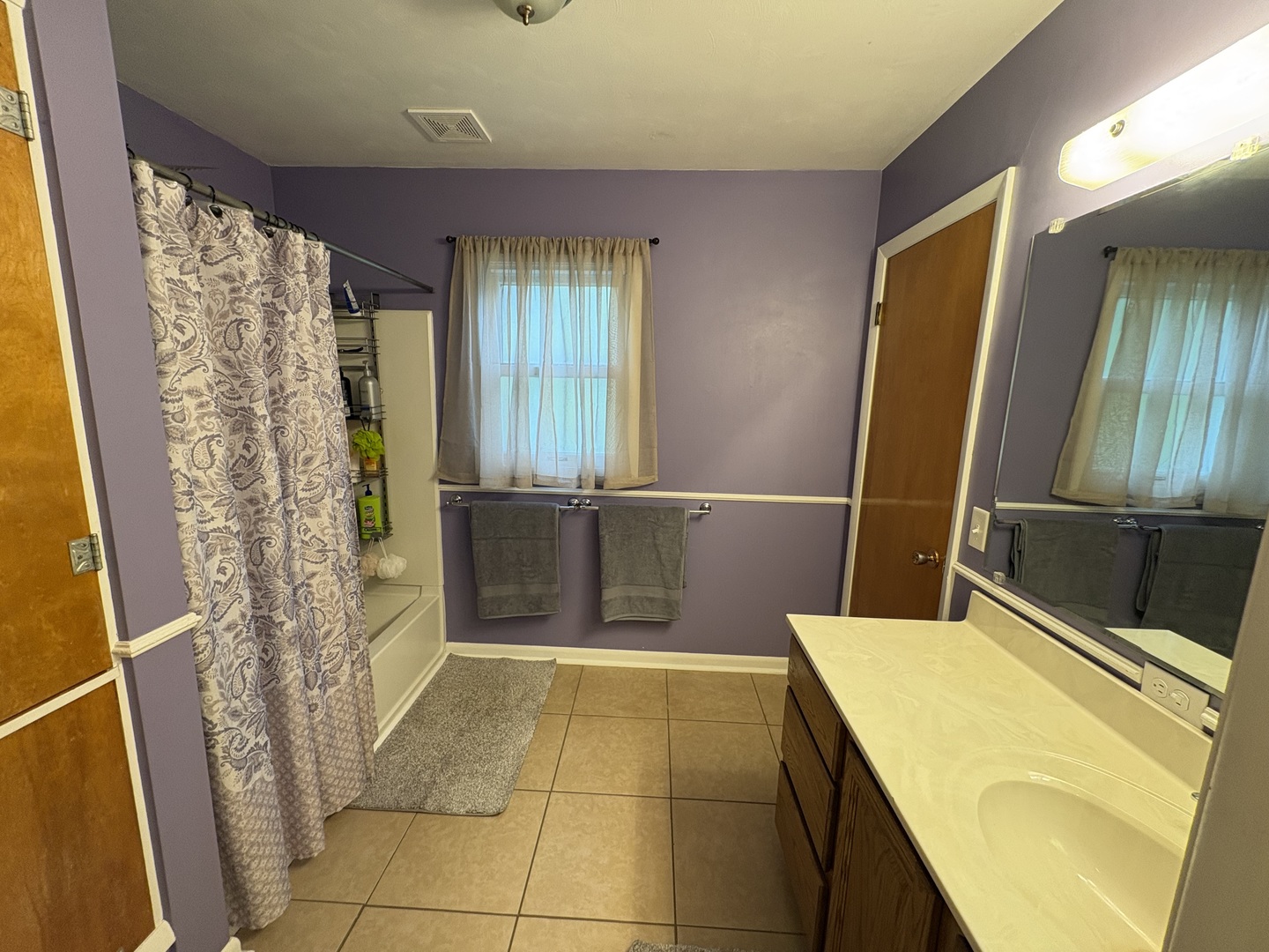 320 South Main Street Creston, IL 61068 - Photo 21 of 34 a bathroom with a bathtub and shower