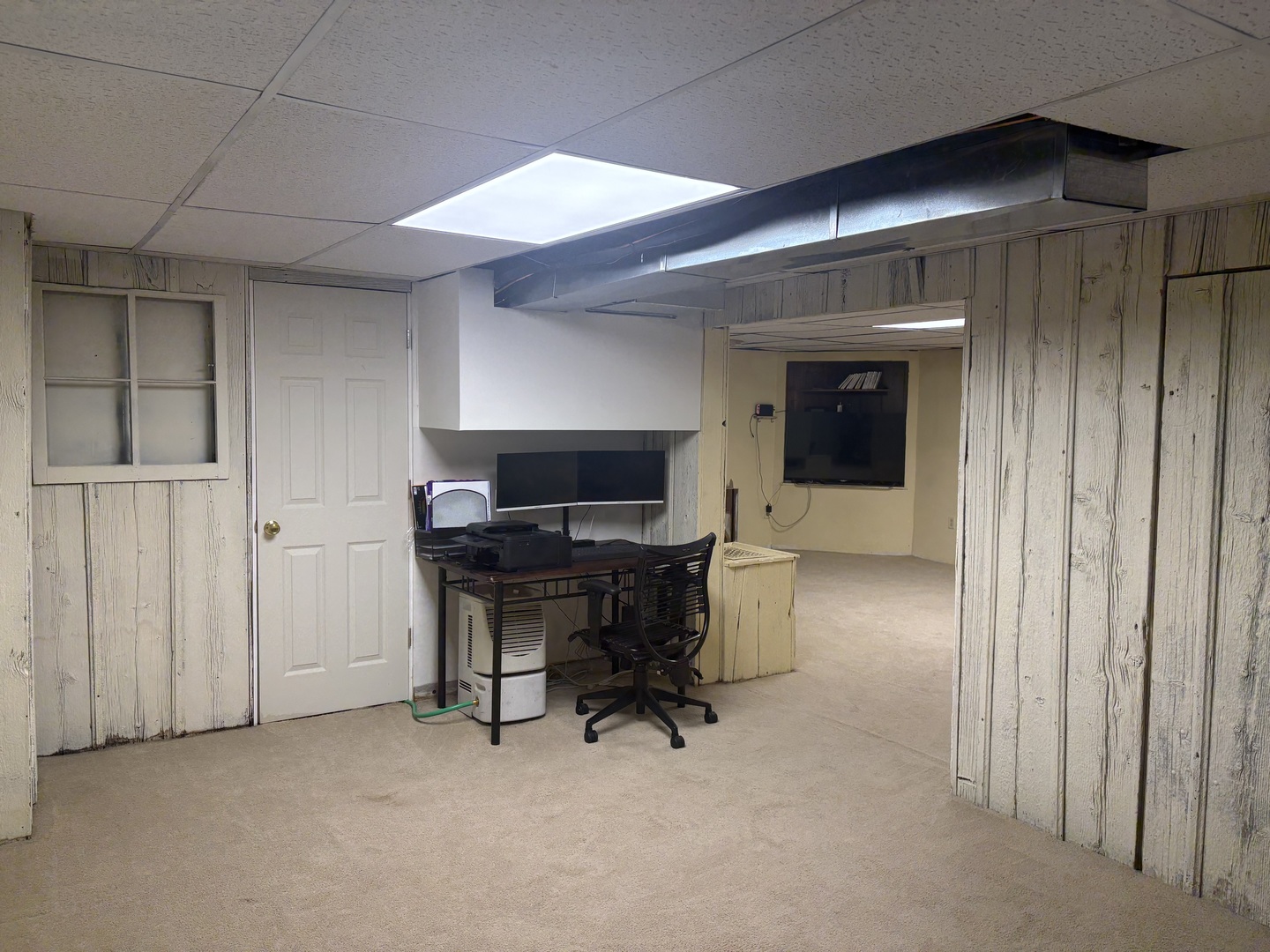 320 South Main Street Creston, IL 61068 - Photo 27 of 34 a view of a workspace with furniture and a window