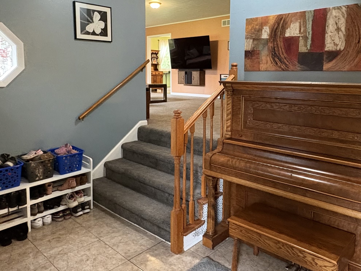 320 South Main Street Creston, IL 61068 - Photo 3 of 34 a view of a livingroom with furniture and staircase