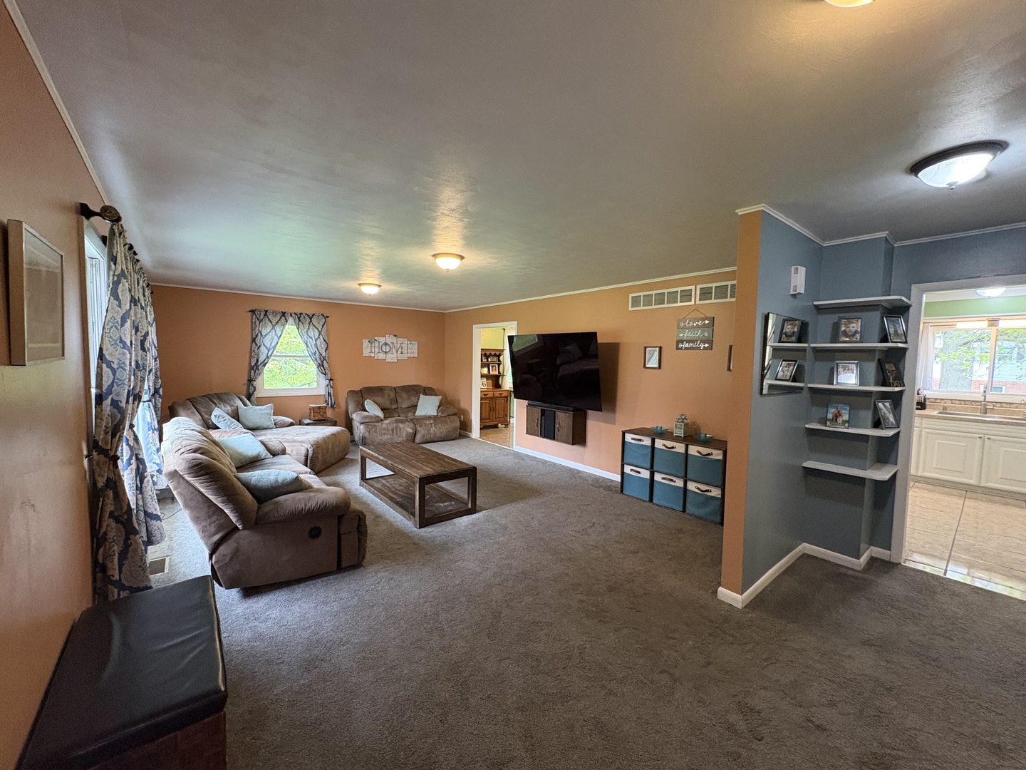 320 South Main Street Creston, IL 61068 - Photo 8 of 34 a living room with furniture and a flat screen tv