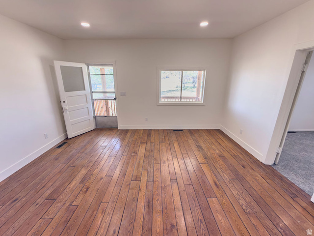 2454 East Old Wellington Road Price, UT 84501 - Photo 7 of 27 Family Room with Fresh Paint and Reclaimed 3/4 in Oak Floors and New Lighting