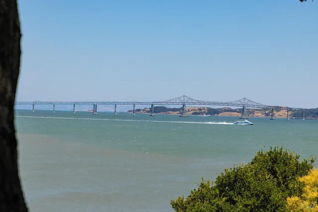 a view of lake with green space