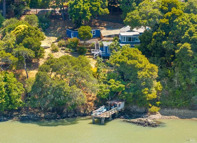 a small pool with couple of water view