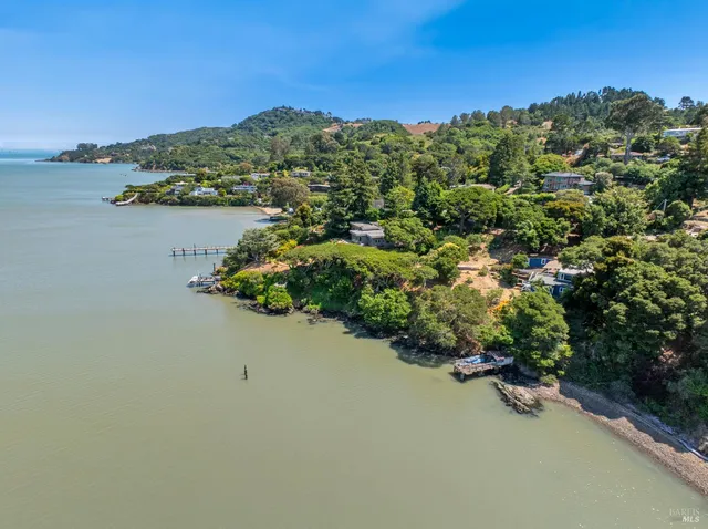 a view of a lake with a mountain in the background