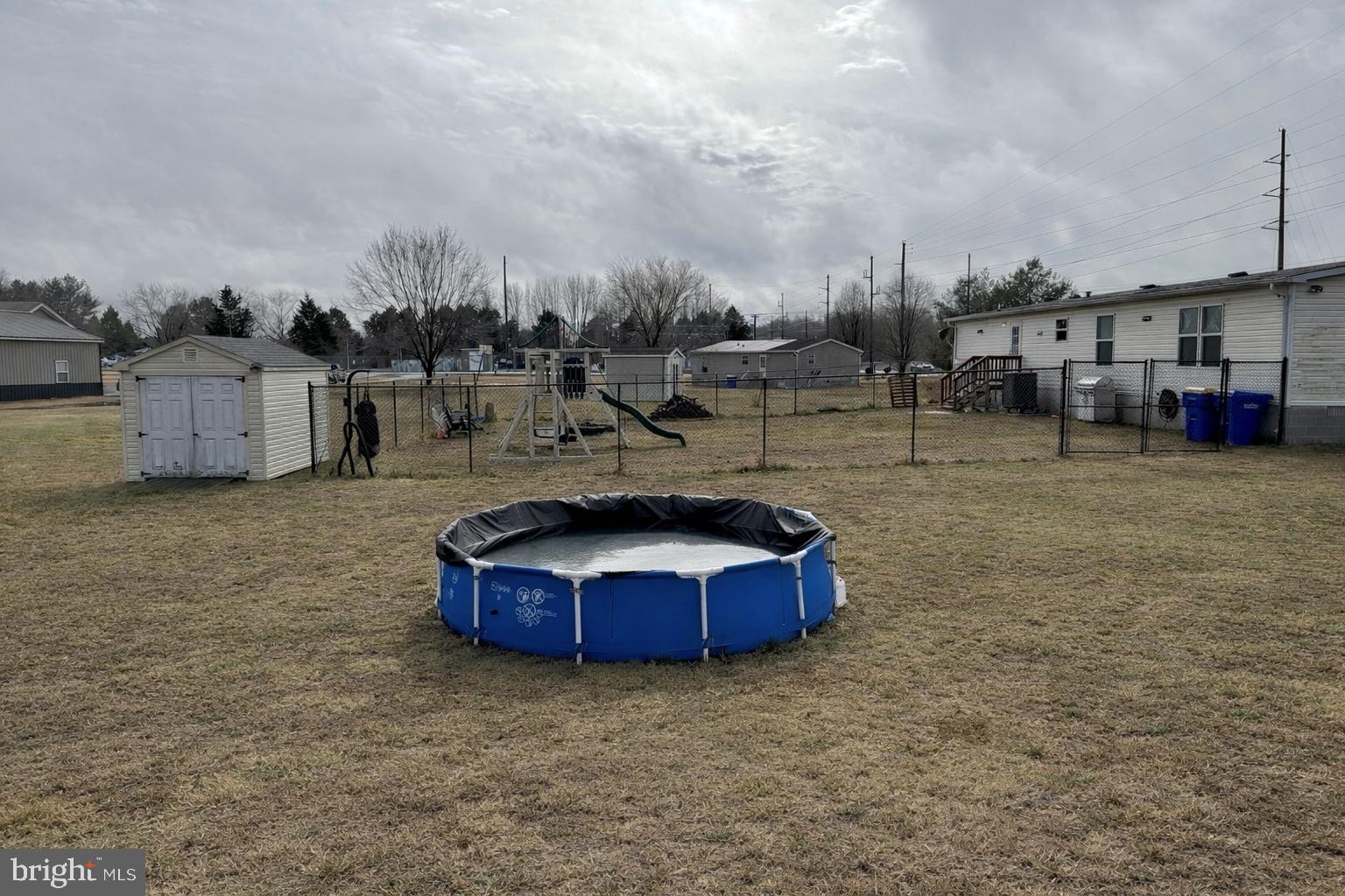 21991 Conrail Road Seaford, DE 19973 - Photo 4 of 21 Side + Backyard View