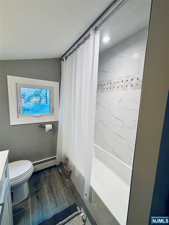 6 Bird Lane, Unit 2 Lake Hopatcong, NJ 07849 - Photo 2 of 7 a bathroom with a toilet and a shower