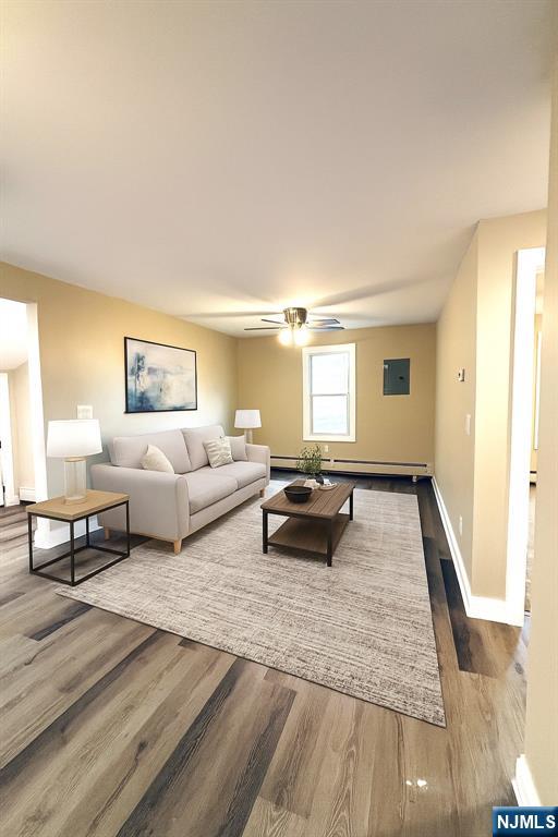 6 Bird Lane, Unit 2 Lake Hopatcong, NJ 07849 - Photo 4 of 7 a living room with furniture and a couch