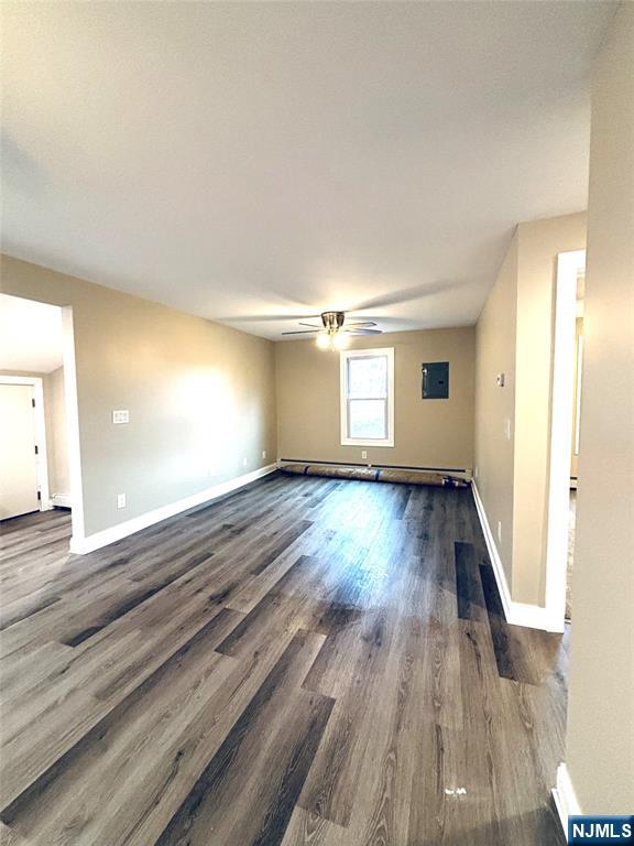 6 Bird Lane, Unit 2 Lake Hopatcong, NJ 07849 - Photo 5 of 7 wooden floor in an empty room with a window