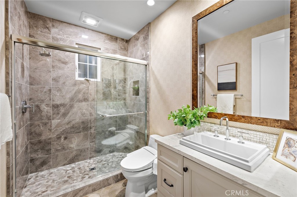 168 Bellini Irvine, CA 92602 - Photo 13 of 29 a bathroom with a sink toilet and shower