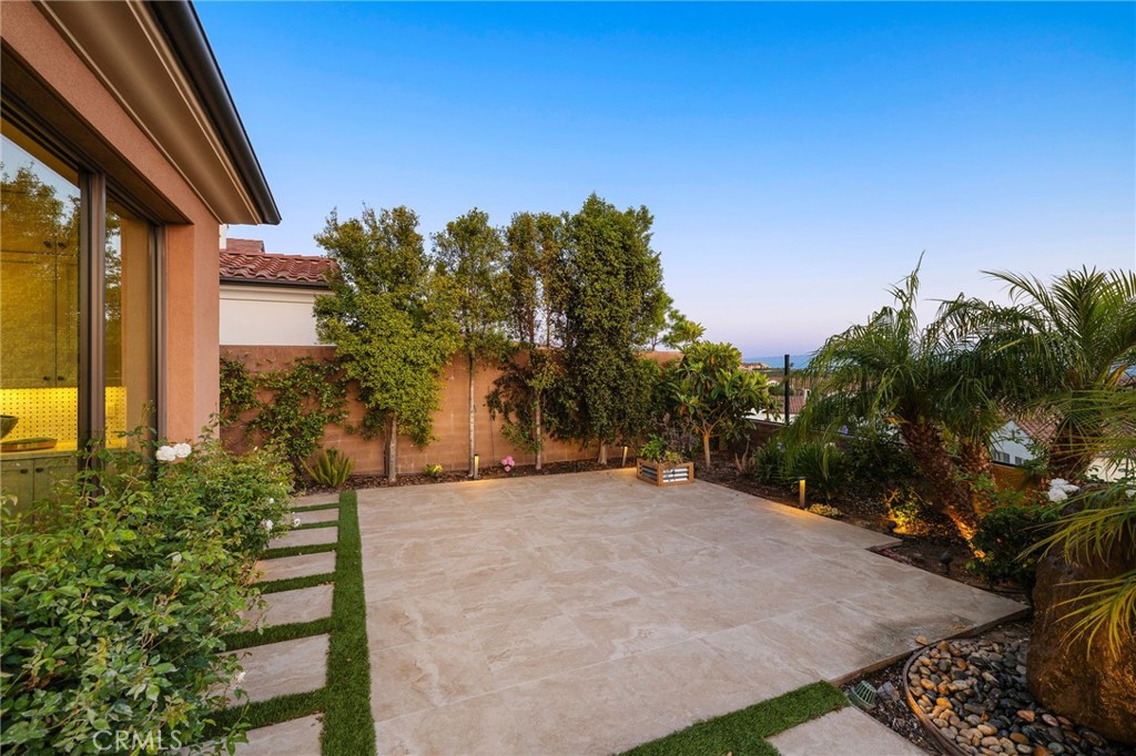 168 Bellini Irvine, CA 92602 - Photo 15 of 29 a view of a house with a yard and potted plants