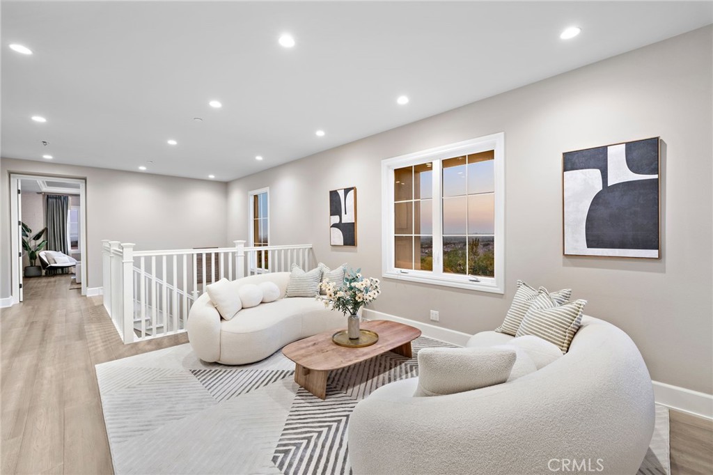 168 Bellini Irvine, CA 92602 - Photo 18 of 29 a living room with furniture and a large window