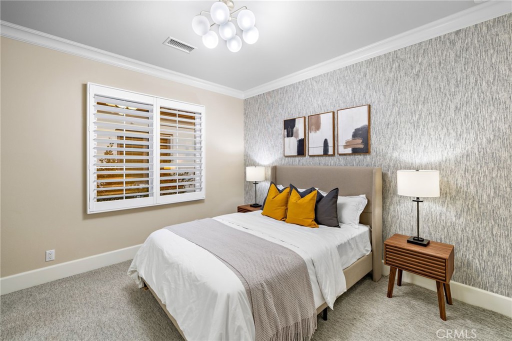 168 Bellini Irvine, CA 92602 - Photo 23 of 29 a bedroom with a bed and a night stand