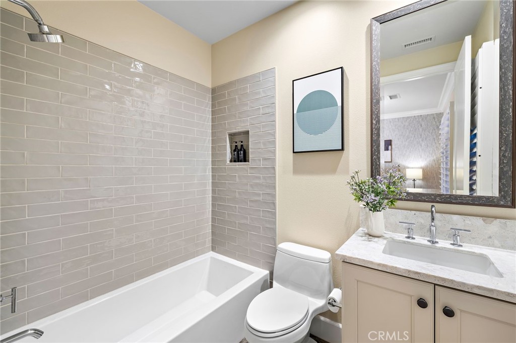 168 Bellini Irvine, CA 92602 - Photo 24 of 29 a bathroom with a sink toilet and shower