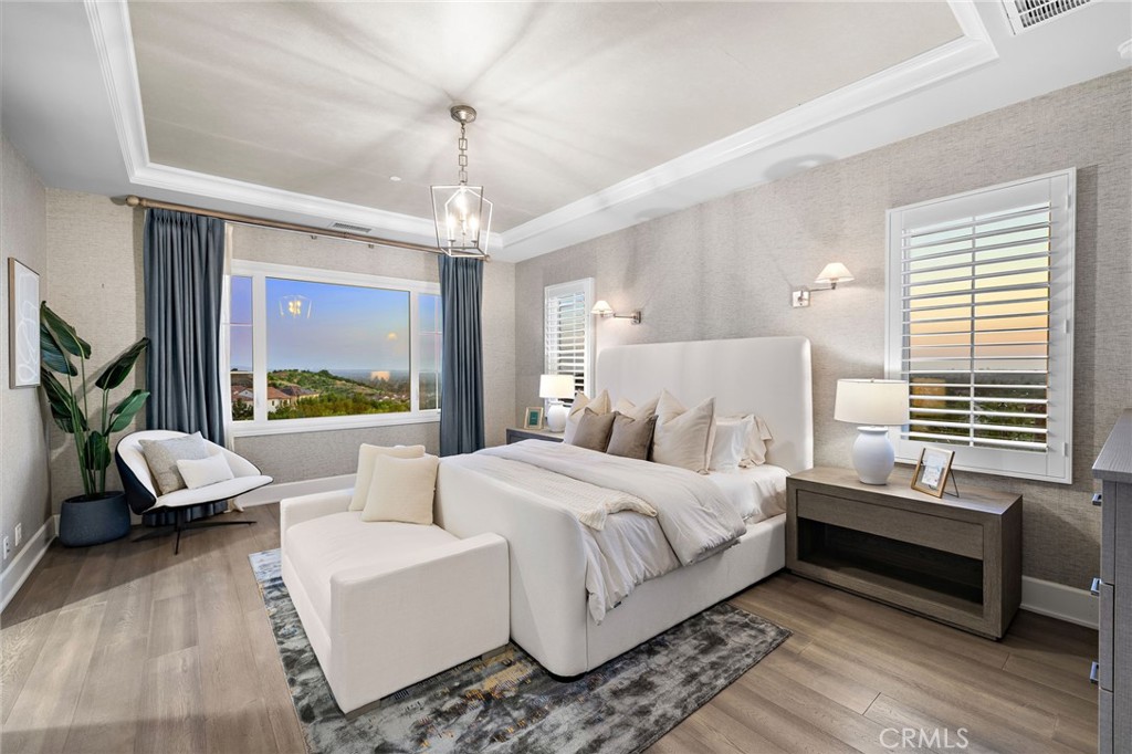 168 Bellini Irvine, CA 92602 - Photo 25 of 29 a bedroom with a large bed and a couch