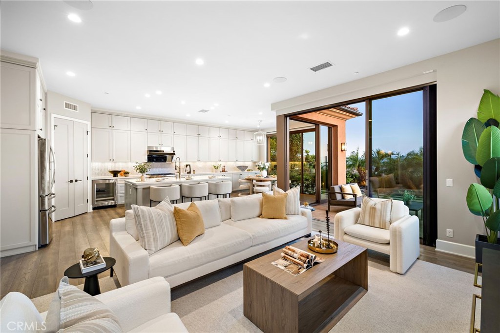 168 Bellini Irvine, CA 92602 - Photo 4 of 29 a living room with furniture and a large window