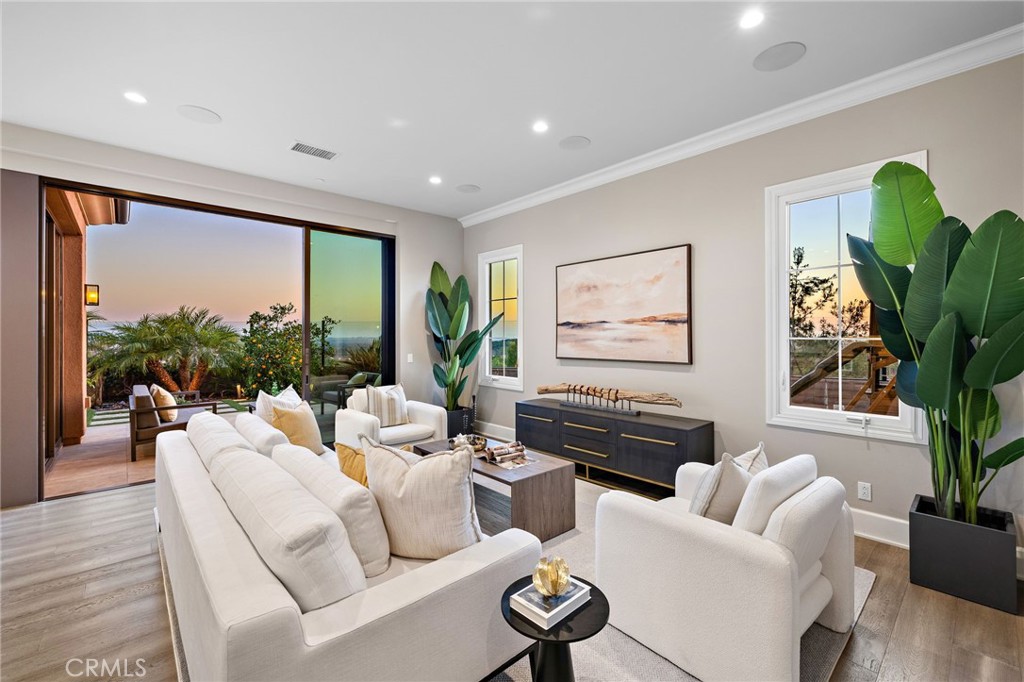 168 Bellini Irvine, CA 92602 - Photo 5 of 29 a living room with furniture and a large window