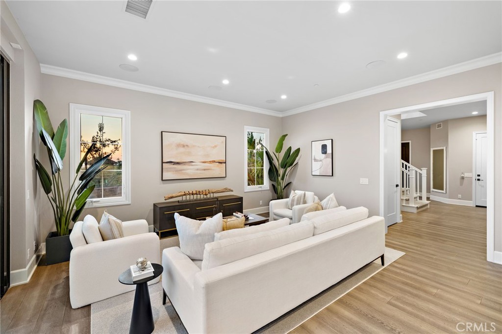 168 Bellini Irvine, CA 92602 - Photo 7 of 29 a living room with furniture