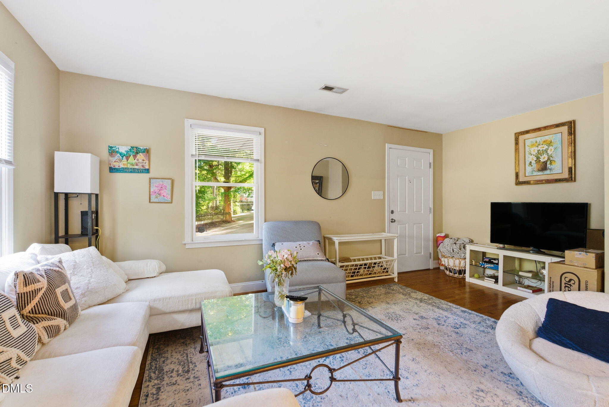 2816 Everett Avenue Raleigh, NC 27607 - Photo 10 of 44 a living room with furniture and a flat screen tv