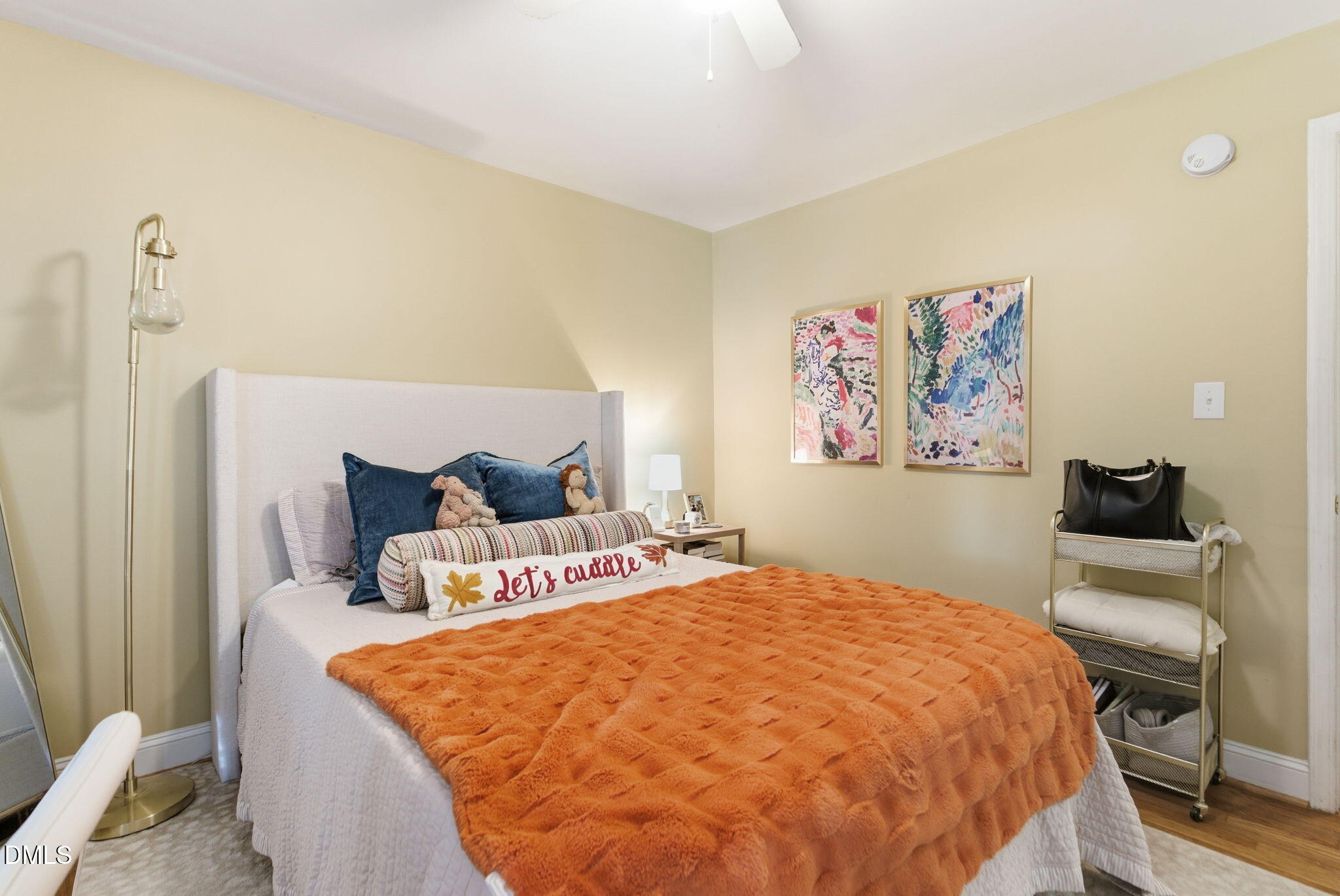 2816 Everett Avenue Raleigh, NC 27607 - Photo 19 of 44 a bed sitting in a bedroom next to a small yard