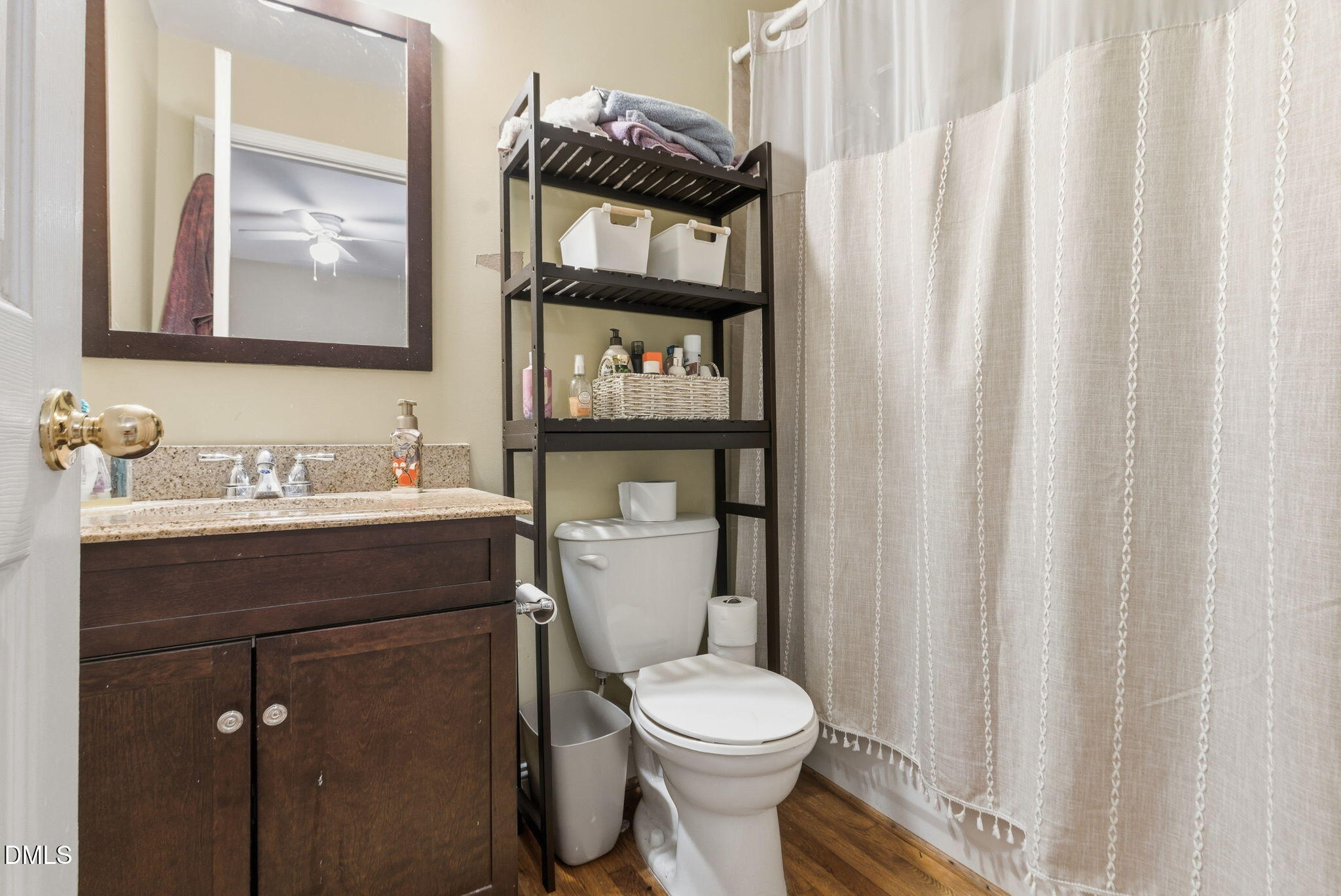 2816 Everett Avenue Raleigh, NC 27607 - Photo 21 of 44 a bathroom with a toilet sink and vanity