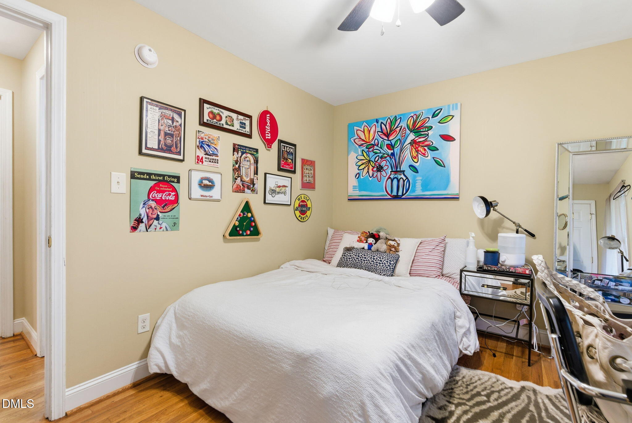 2816 Everett Avenue Raleigh, NC 27607 - Photo 23 of 44 a bedroom with a bed and a book shelf