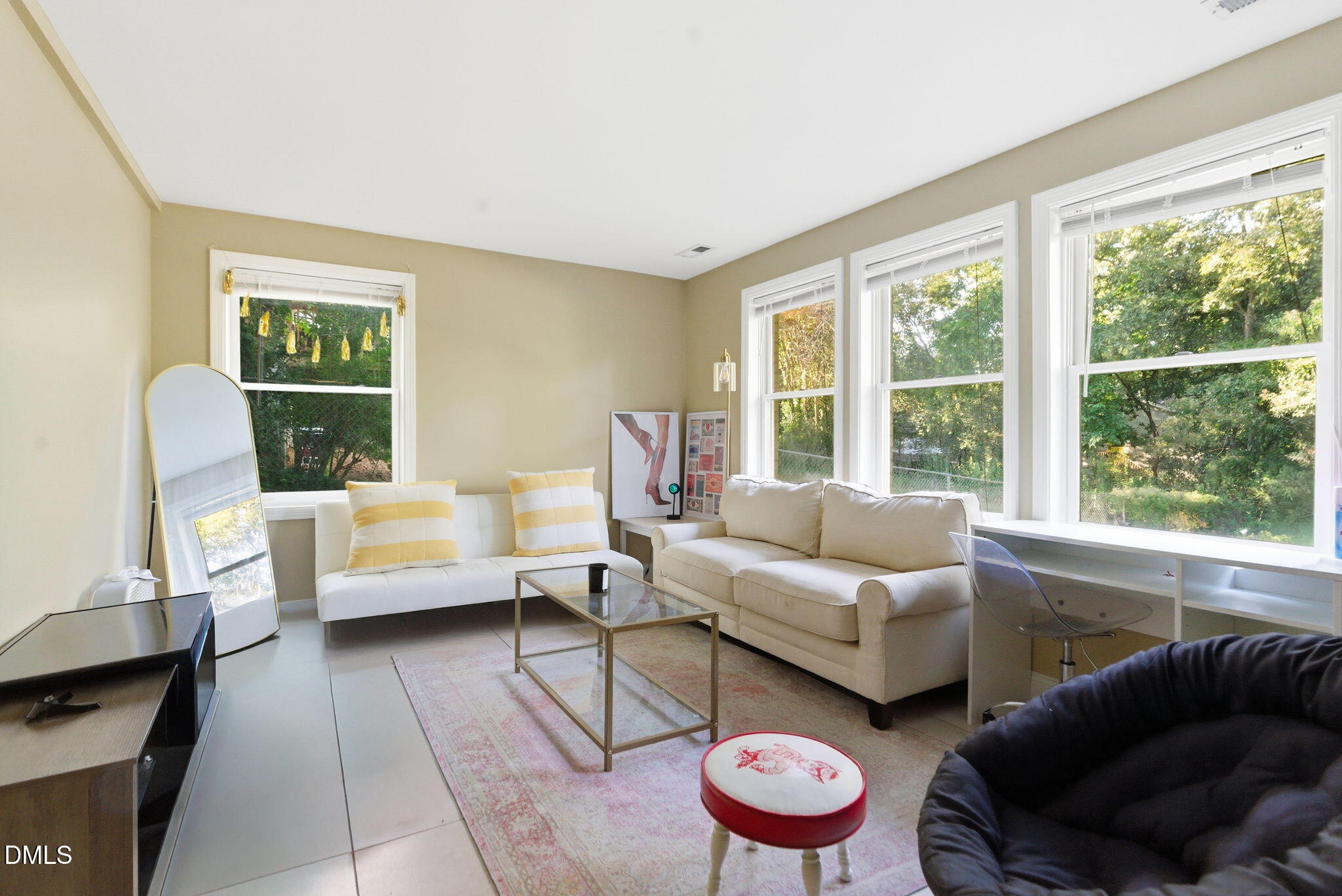 2816 Everett Avenue Raleigh, NC 27607 - Photo 25 of 44 a living room with furniture and a large window