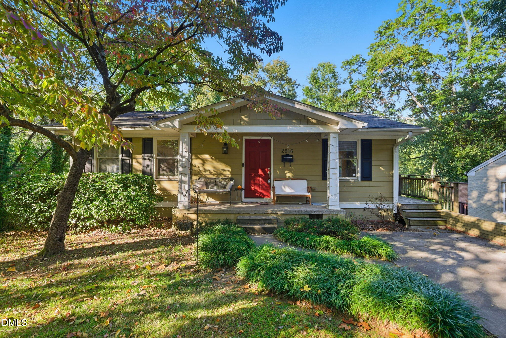 2816 Everett Avenue Raleigh, NC 27607 - Photo 2 of 44 a front view of a house with garden