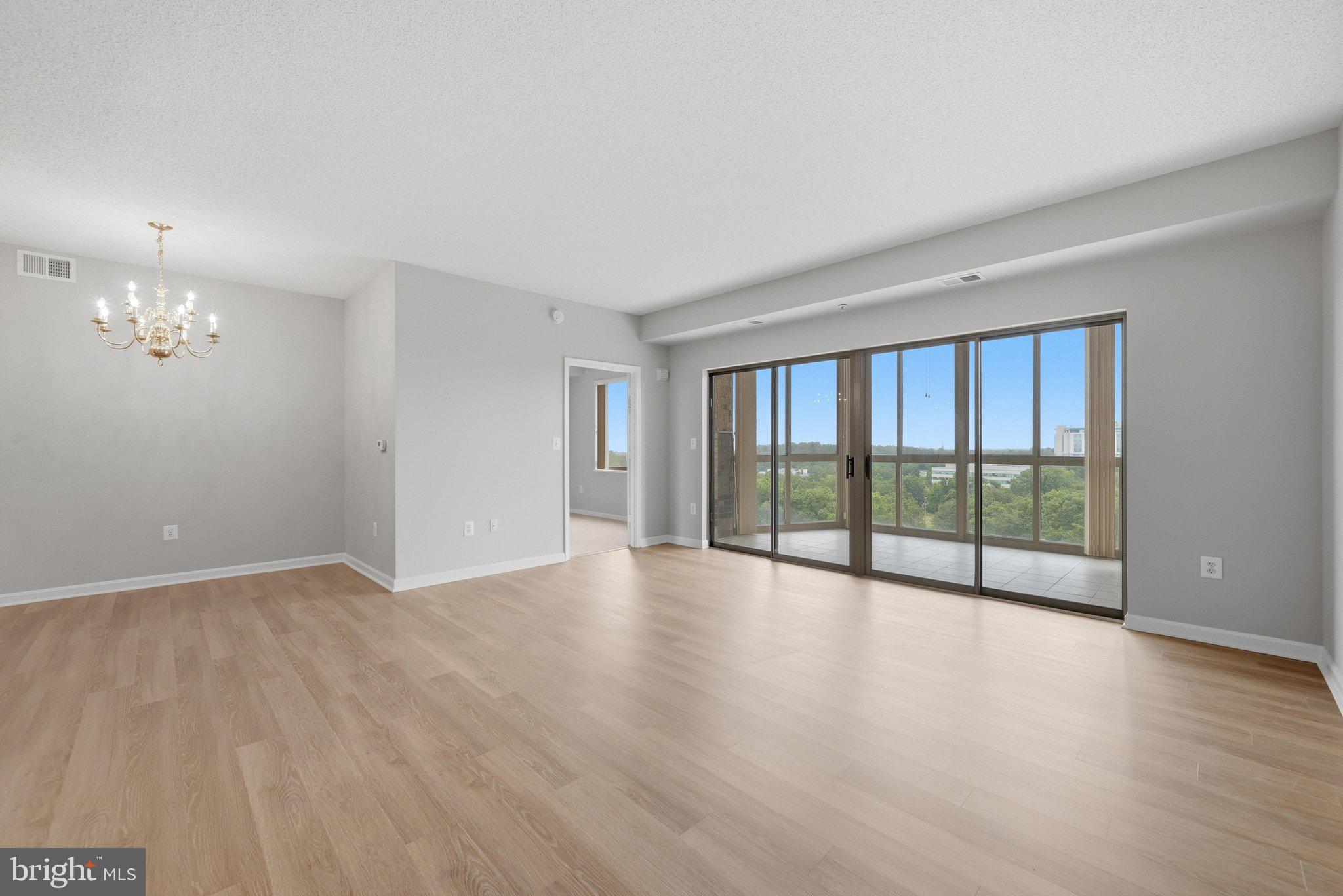 19375 Cypress Ridge Terrace, Unit 922 Leesburg, VA 20176 - Photo 5 of 89 Living Room with new luxury vinyl plank flooring