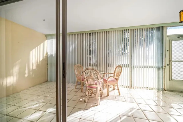 a view of a room with windows