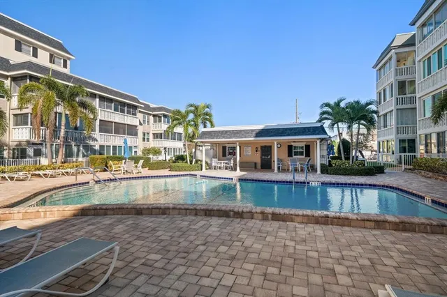 a front view of a house with swimming pool