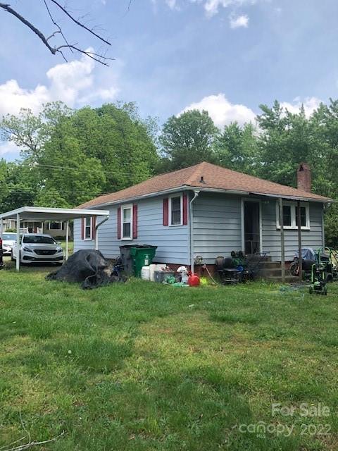 5701 Old Plank Road Charlotte, NC 28216 - Photo 3 of 10 a view of a house with a yard