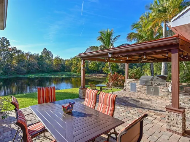 a view of a patio with swimming pool