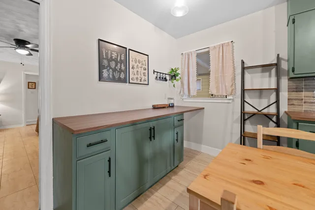 a kitchen with a stove and a sink