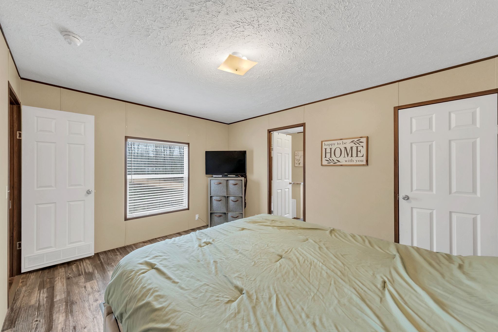 6126 Calvin Potts Road Primm Springs, TN 38476 - Photo 16 of 22 a bedroom with a bed and a window