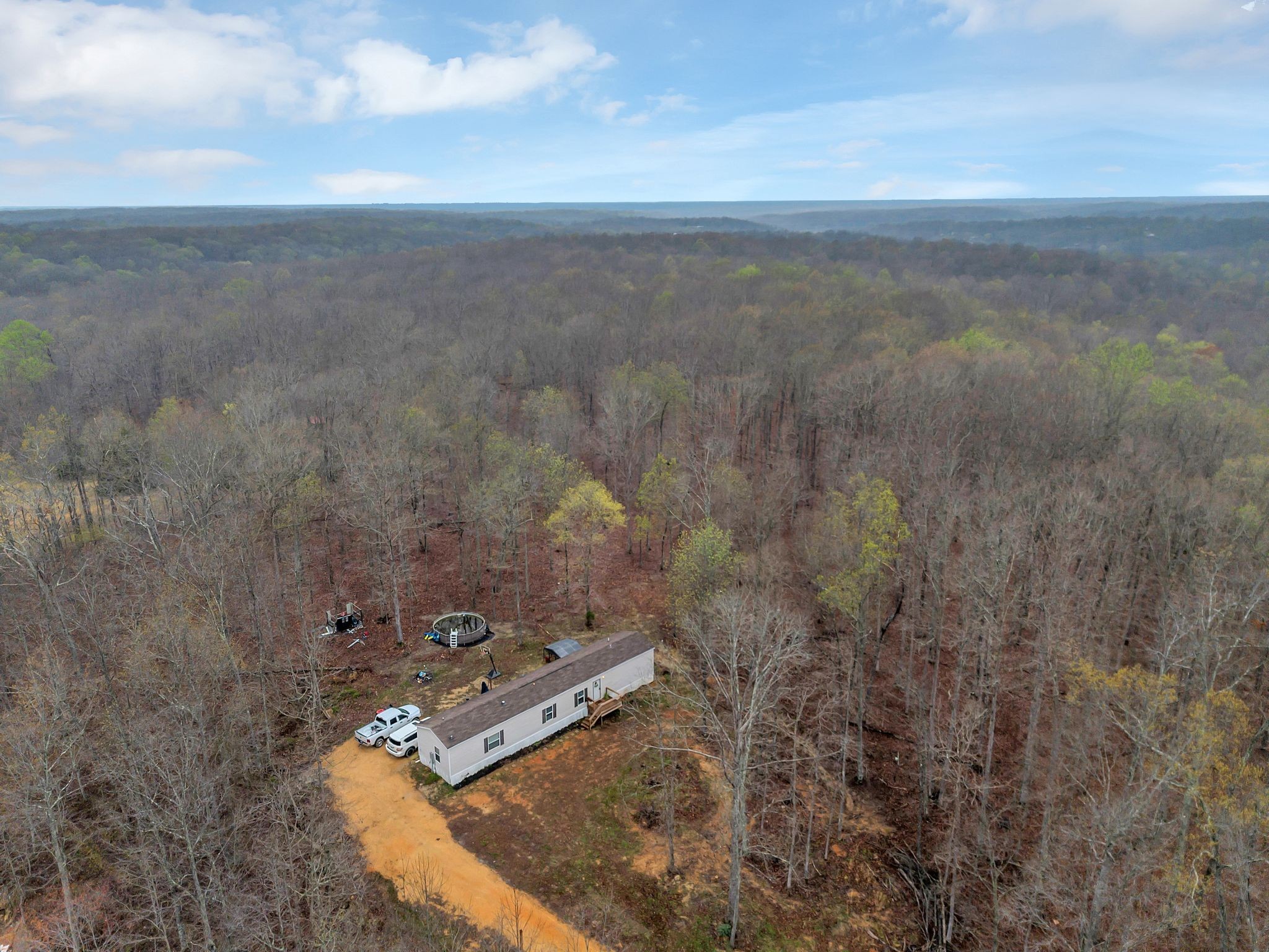 6126 Calvin Potts Road Primm Springs, TN 38476 - Photo 3 of 22 a view of a yard with an outdoor space