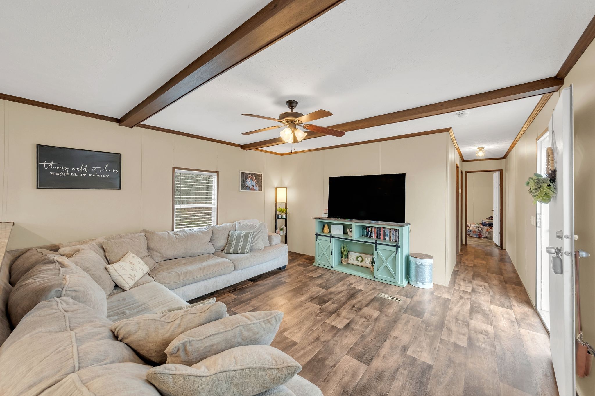 6126 Calvin Potts Road Primm Springs, TN 38476 - Photo 7 of 22 a living room with furniture and a flat screen tv