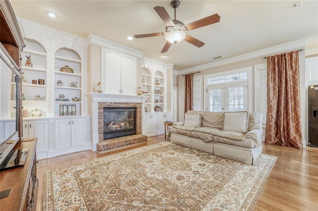 2380 Muskogee Lane Braselton, GA 30517 - Photo 6 of 30 a living room with furniture and a fireplace
