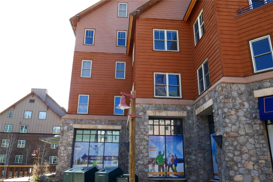 100 Dercum Square, Unit 8374 Keystone, CO 80435 - Photo 11 of 24 a front view of a building with glass windows and brick walls