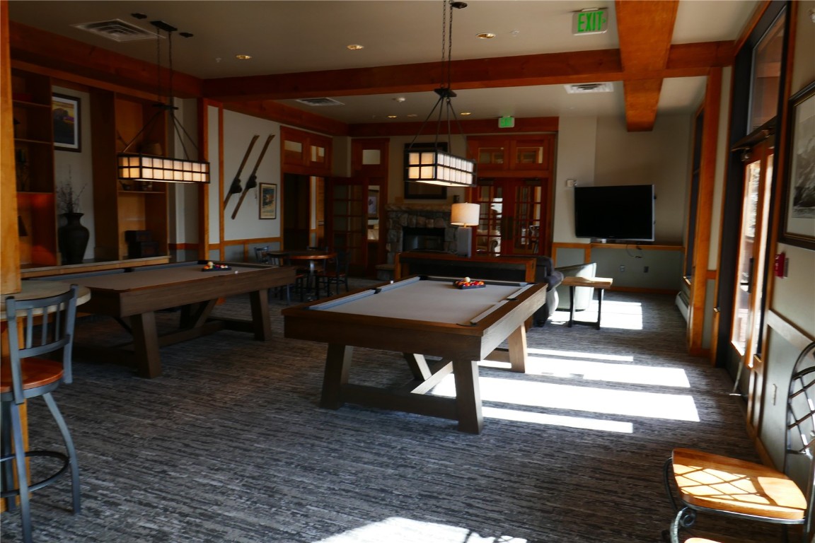 100 Dercum Square, Unit 8374 Keystone, CO 80435 - Photo 15 of 24 a living room with furniture a table and wooden floor