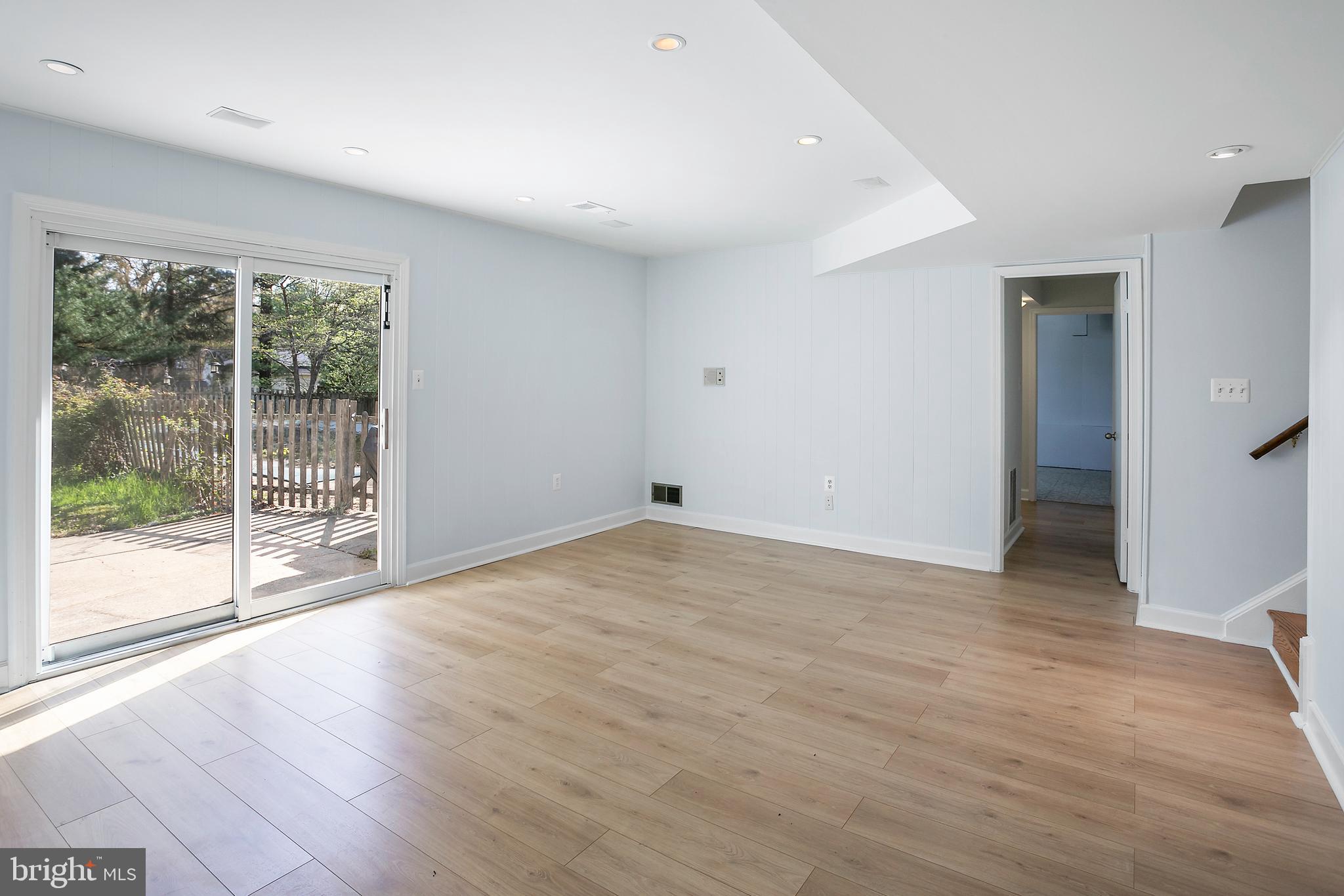 1420 Billman Lane Silver Spring, MD 20902 - Photo 24 of 44 a view of empty room with wooden floor and fan