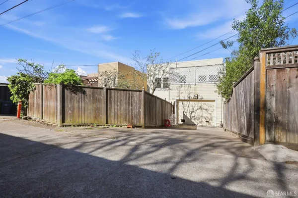 a view of a back yard of the building