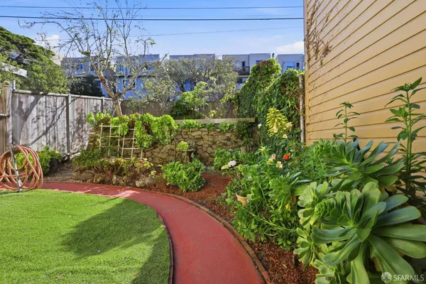 a view of a garden with flowers