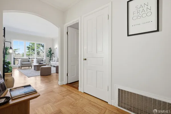 a living room with furniture and a rug