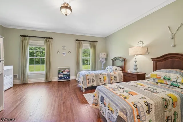a view of a door and wooden floor